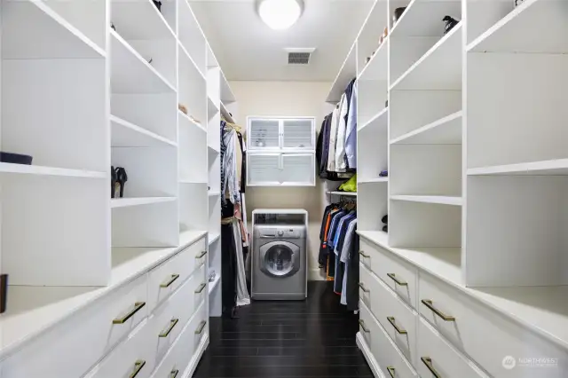 Primary walk in closet with Euro washer/dryer unit