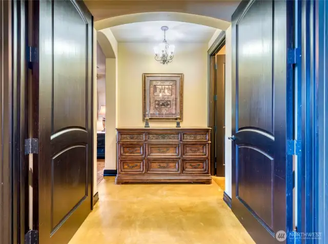 8' High Mahogany Double Door Entry To Main Floor Primary Suite