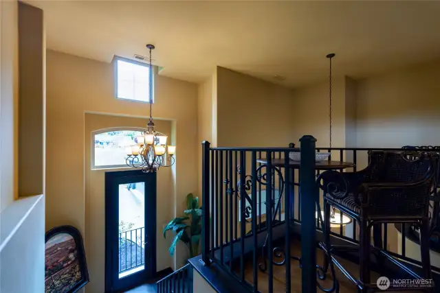 Step Upstairs to 2 Adtl Primary Suites and Library area