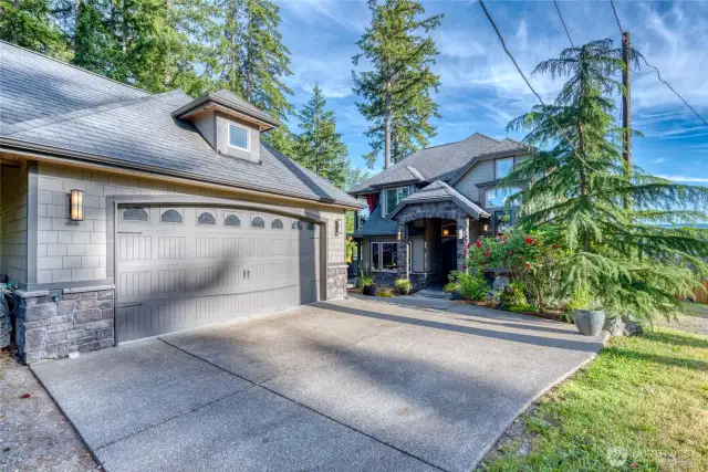 2 Car Garage w/Car Port and Surrounding Mature Landscaping