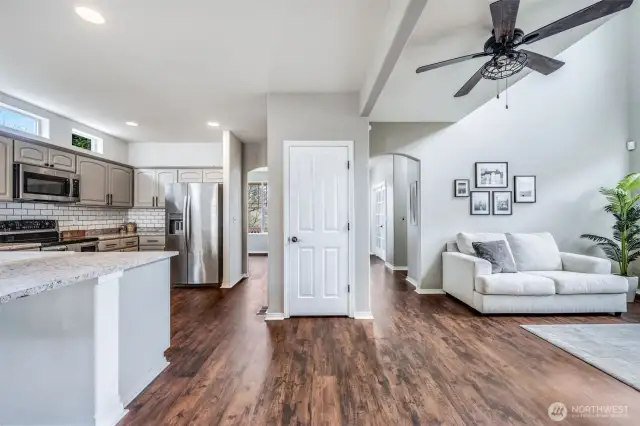 The open-concept design seamlessly connects the kitchen, living room, and breakfast nook, creating a bright and spacious flow that’s perfect for everyday living and entertaining.