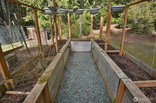 9 enclosed garden beds await your plantings.