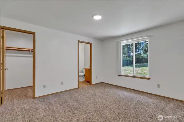 Spacious Primary BR on one side of the home with it's own private bath