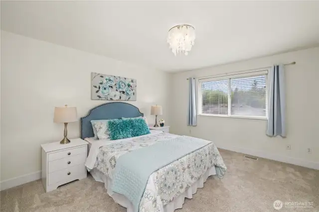 Large primary suite with 5 piece bathroom & walk-in closet.