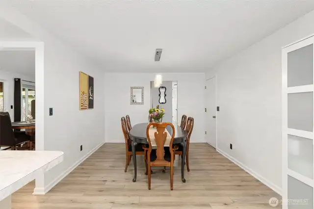 Large dining room accommodates a 10 person table.