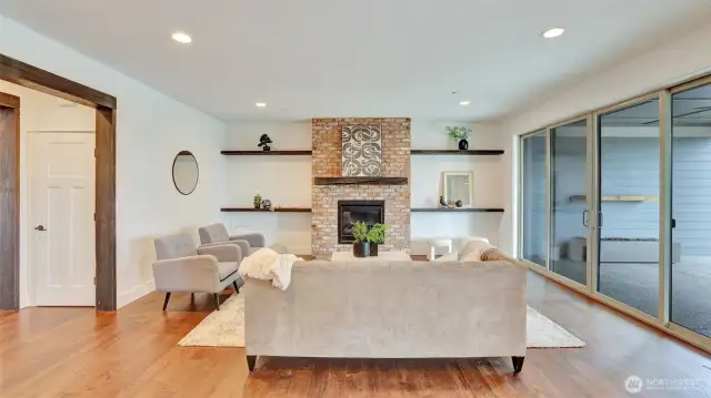 There's room for in this over sized family that overlooks the backyard and pool