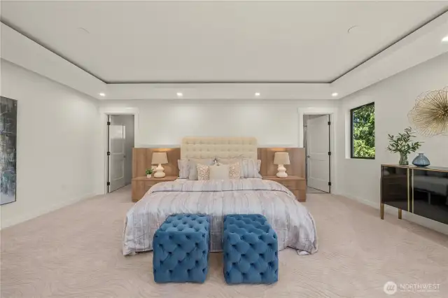 The second bedroom suite upstairs offers generous space, a private bathroom with a shower—perfect for family or guests.