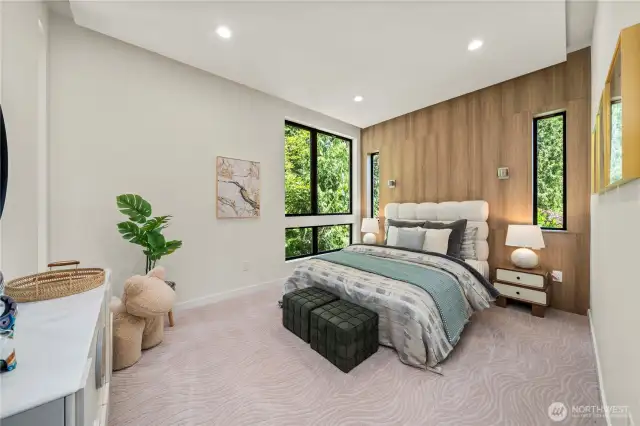A large bedroom suite /2nd master on the main level offers flexible space ideal for guests, a home office, or multi-generational living.