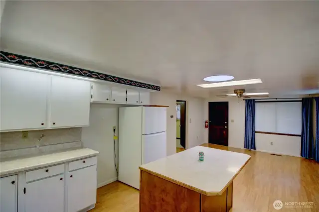 Big kitchen with island, great storage, and room to gather