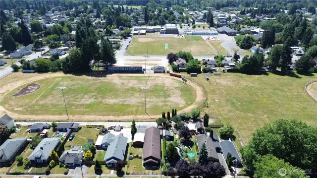 Downtown location, fully fenced yard, rare parking galore!