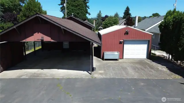 Fully fenced backyard with alley access and abundant parking