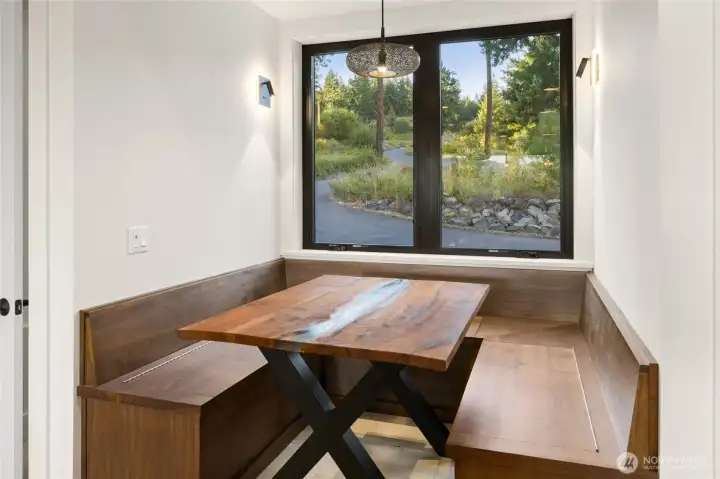 Breakfast Nook with custom table.  Each bench has it own extra storage area.