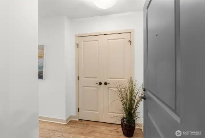 lovely wide entry with double door closet for coats, etc