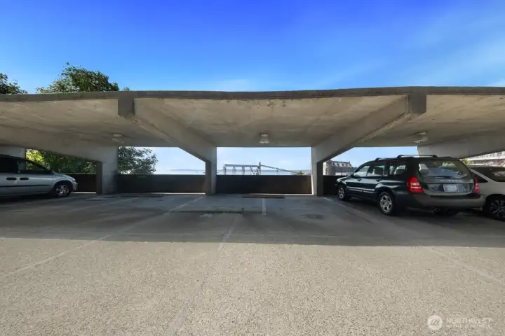 Two covered parking space numbers: 43 and 44