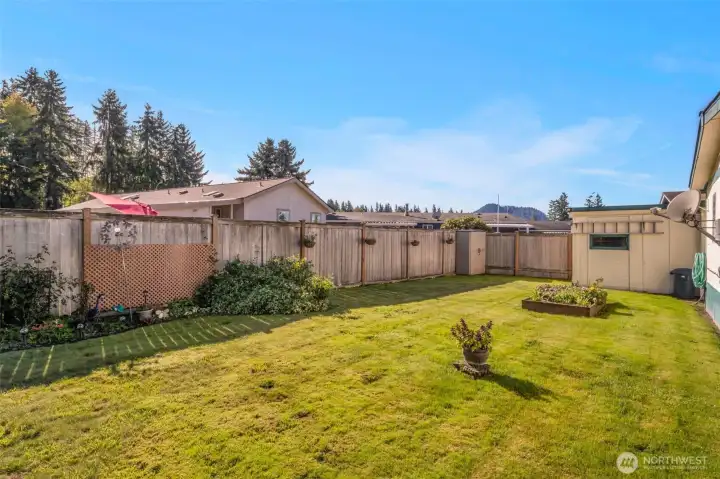 Private fenced backyard.