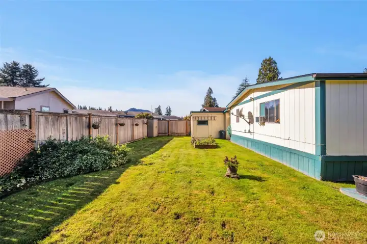 Private fenced backyard.