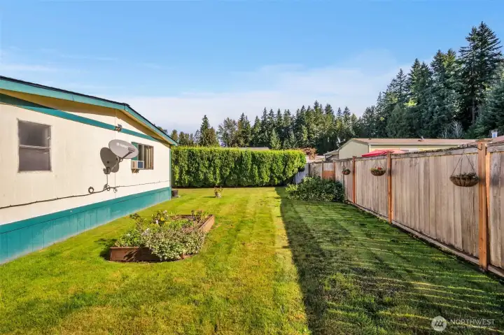 Private fenced backyard.