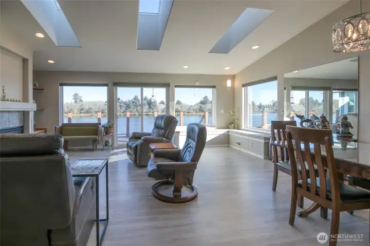 When you enter the front door, you get this expansive view of Duck Lake and the islands. The perfect place to sit in front of the fireplace, under the skylights, during an ocean storm.