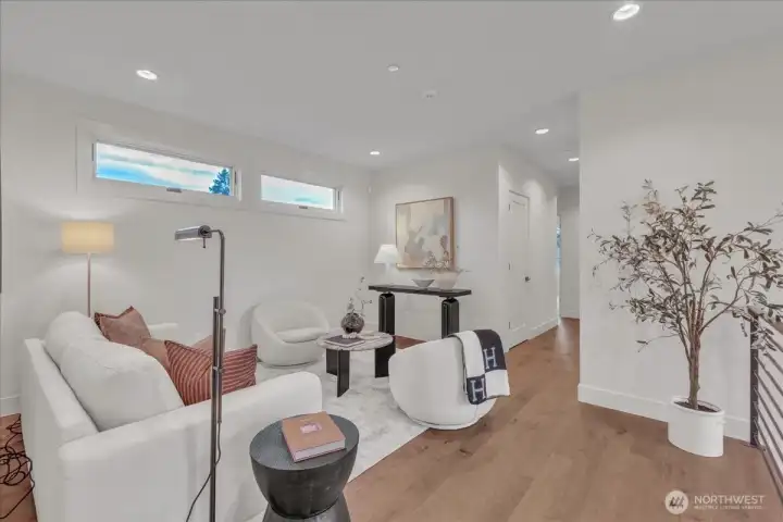 Upper level loft! Perfect space for playroom or den.