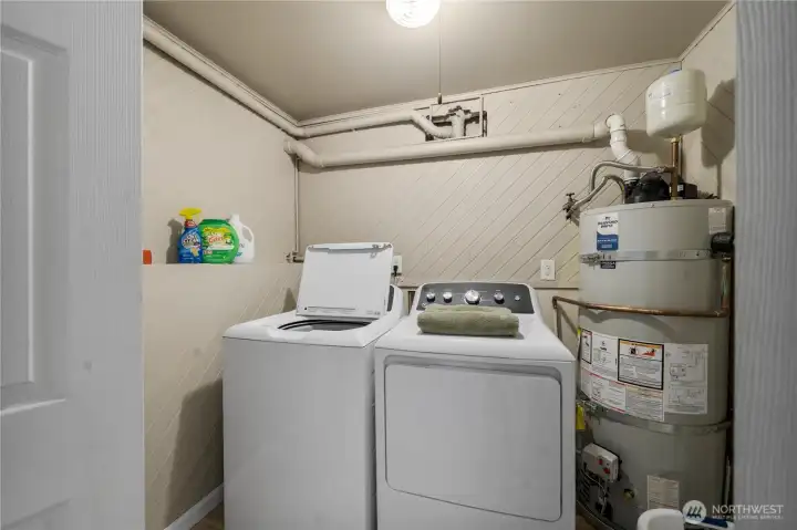 The Laundry. GE Washer/Dryer Stay and a Brand New Top of the line Hot Water Heater.