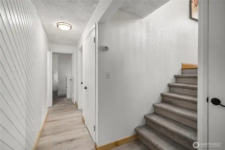 Let’s go downstairs to 3 more bedrooms, the laundry and another bathroom.