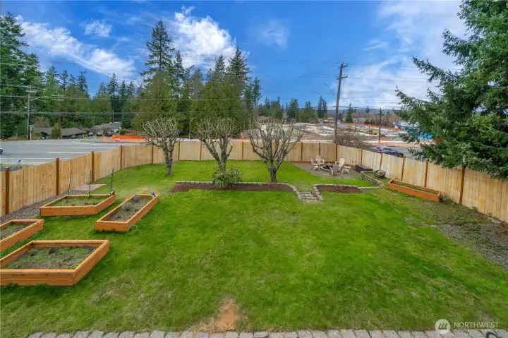 Another view of the fully fenced backyard. Plenty of space for recreation, entertaining and relaxing.