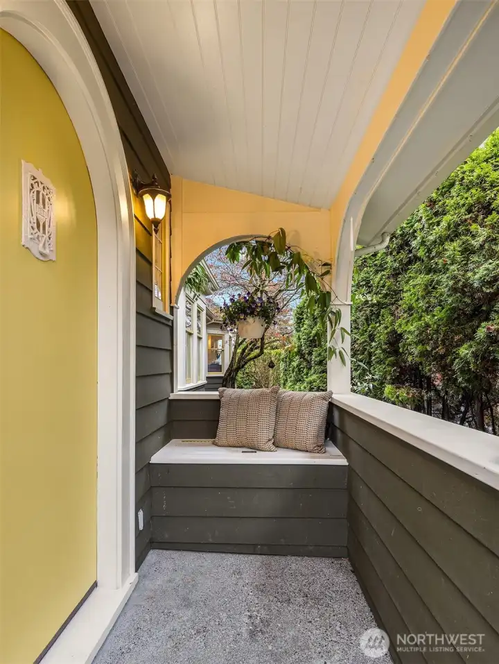 Sweet front porch with built-in bench seat