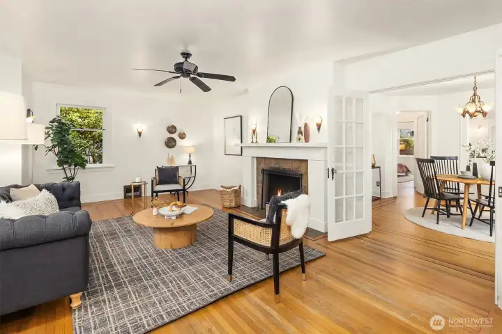 Living room with inlaid oak flooring.