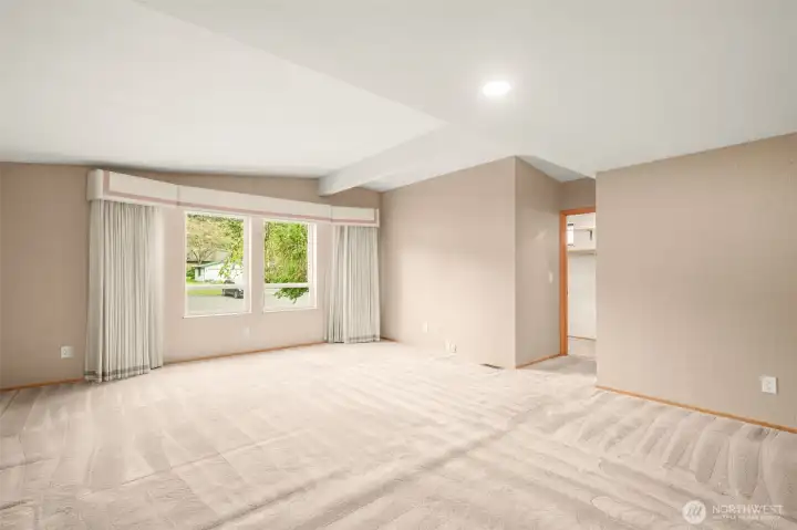 Large primary suite with walk-in closet and 3/4 bath with walk-in shower