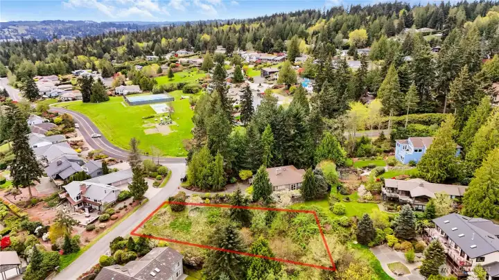Positioned in a well-established Port Ludlow neighborhood with nearby green space, outdoor activities, a peaceful residential setting.