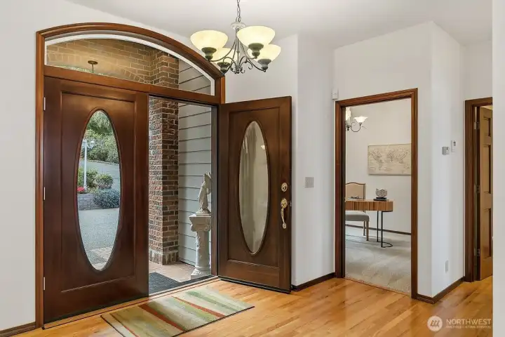Double door entry with transom window for maximum light.
