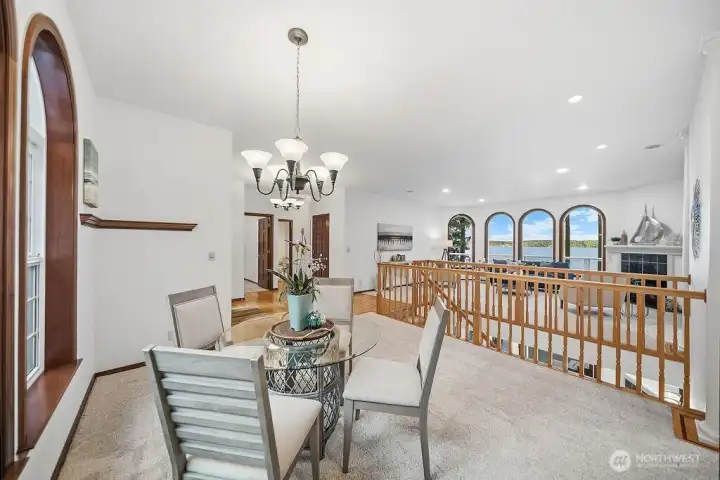 View of Dining, Living, and 1/2 Bath shows the spacious living areas.