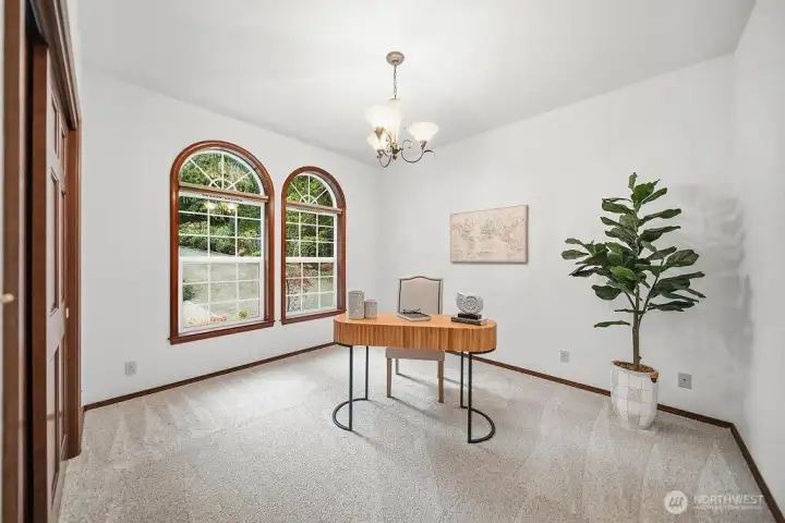 This room can be your Bedroom #2 on the Main Floor or an upper den/office.