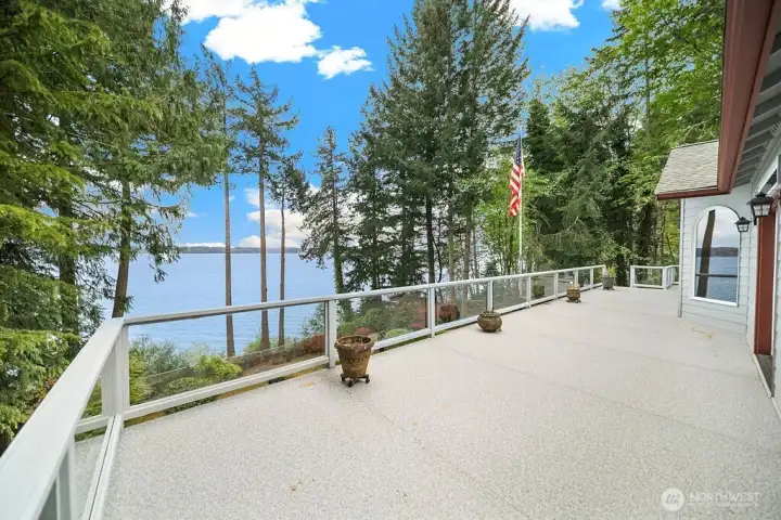 Main Floor Deck with Glass Panel Railing System.