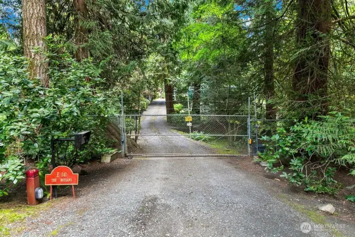 This 1.27 ACRE property is FULLY fenced and has an electric gate.  Extra Tall fencing to keep the Deer from eating your garden and landscaping. An abundance of privacy from Winterwood Drive.