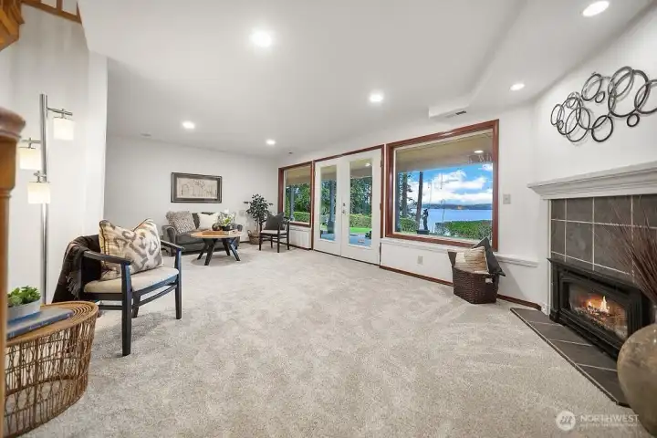 LOWER LEVEL.... Expansive Family Room with kitchenette and eating bar. Plus 2 more bedrooms, Den/office, Rec Room, Workout Room and about 100 sq ft unfinished area for Mechanical storage.  Efficient Furnace for heat & AC with heat pump!