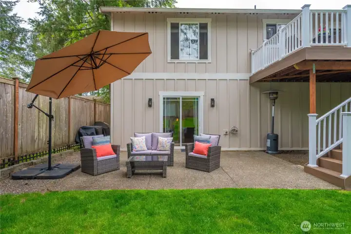 The lower-level patio is a wonderful conversation space to enjoy on sunny days or starry nights.
