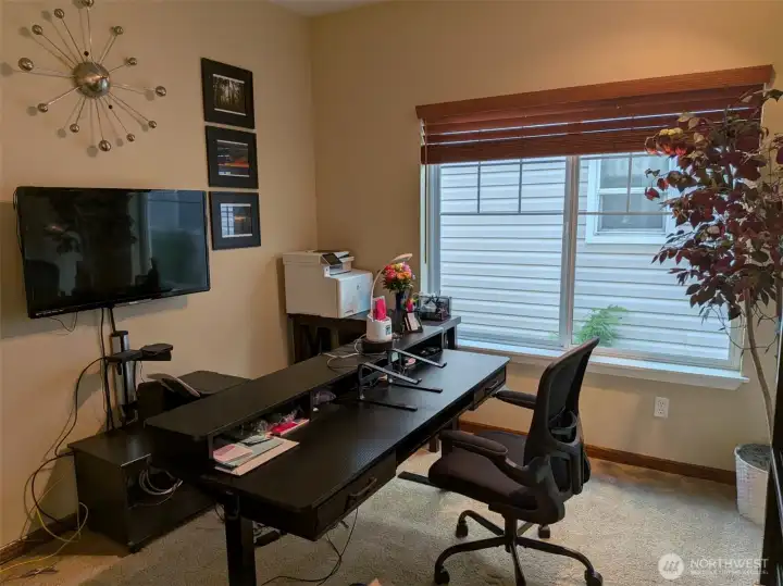This downstairs (3rd) bedroom is used as an office. This downstairs (3rd) bedroom is used as an office.