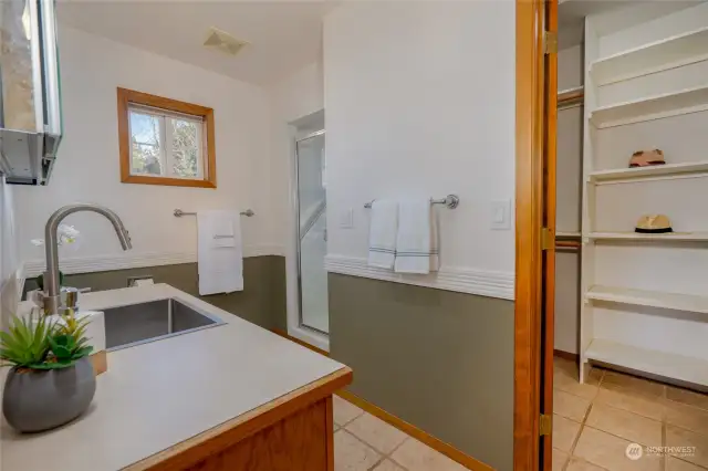 Primary bathroom with walk-in closet.