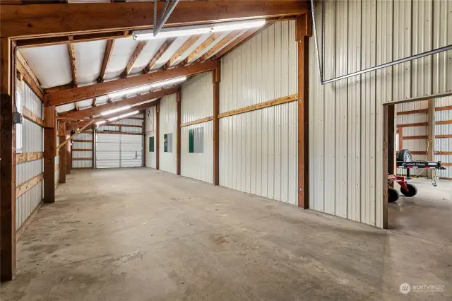 This area of the shop has overhead doors at each end. Ability to drive through.