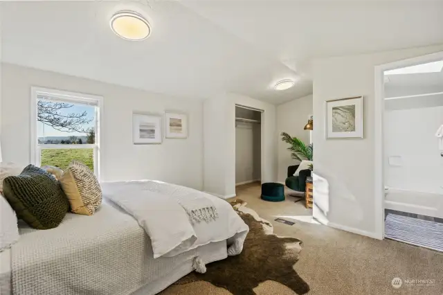 Primary bedroom with en-suite bath