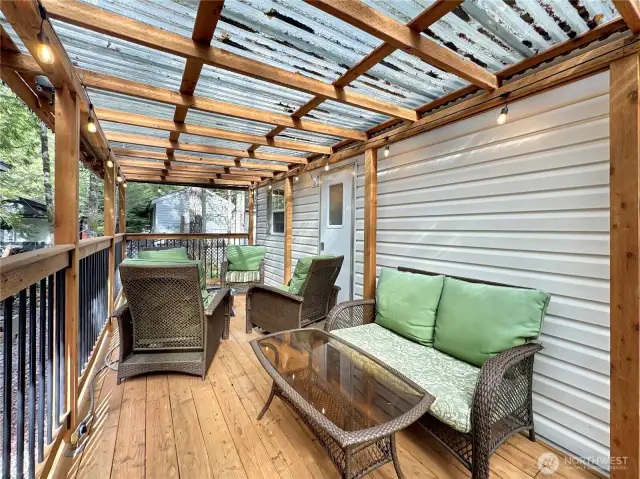 Plush seating on the deck for outdoor gatherings.