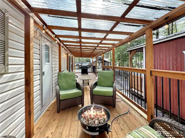 Propane fire pit can be enjoyed on the deck under cover at any time!