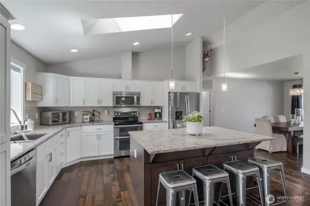 Granite and tile back splash.