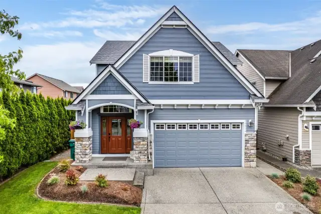 Recent roof, exterior paint, mature landscaping, sprinkler system.