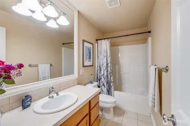 Secondary full bathroom. Tile work.