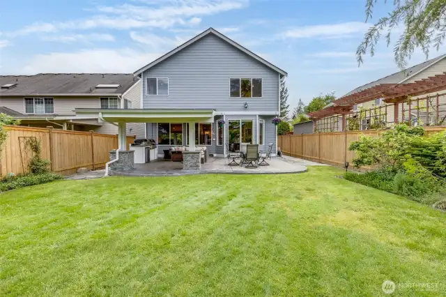 Large yard, nice and mature landscaping. Sprinkler system.