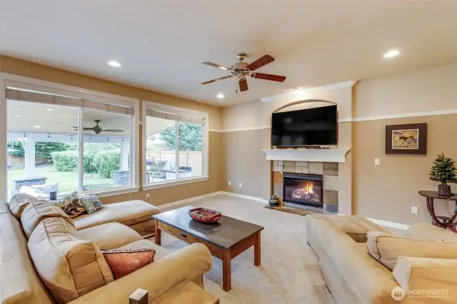 Lots of windows, extends to outdoor space and beautiful covered patio.