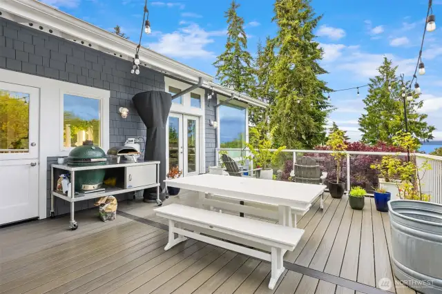 The large deck can be easily accessed from the main living area. Enjoy outdoor dining, cocktails and BBQ's
