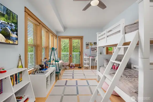 Main floor bedroom has access to the deck and a full attached bath and closet. All 3 bedrooms have en-suite baths.